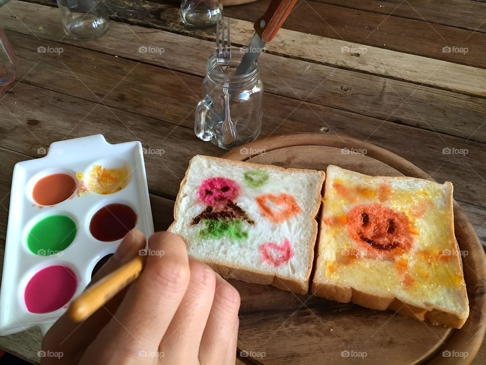 painting bread with color food