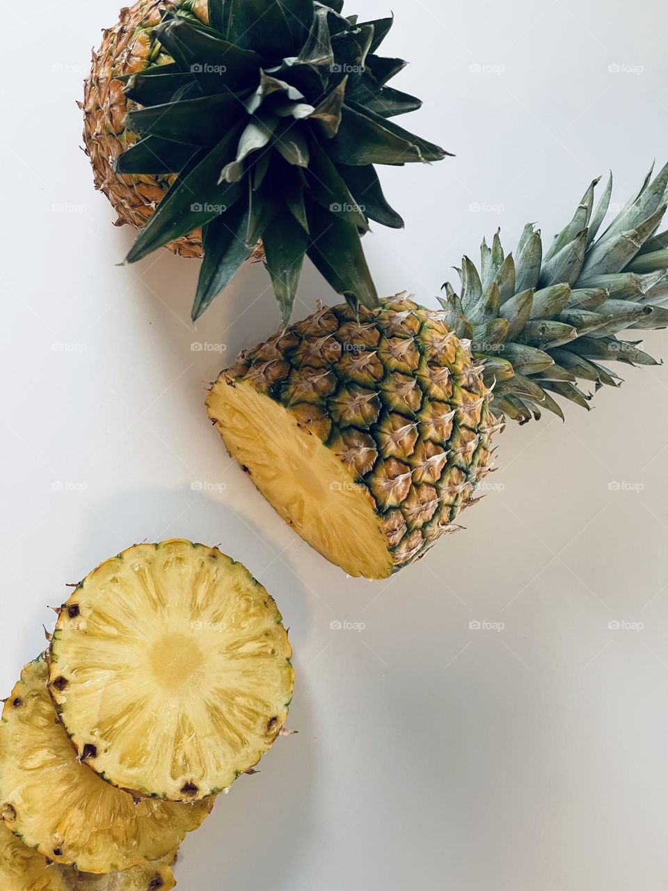 Juicy yellow pineapple slices from above, tropical fruit, Latin American fruit, edible bromeliad 