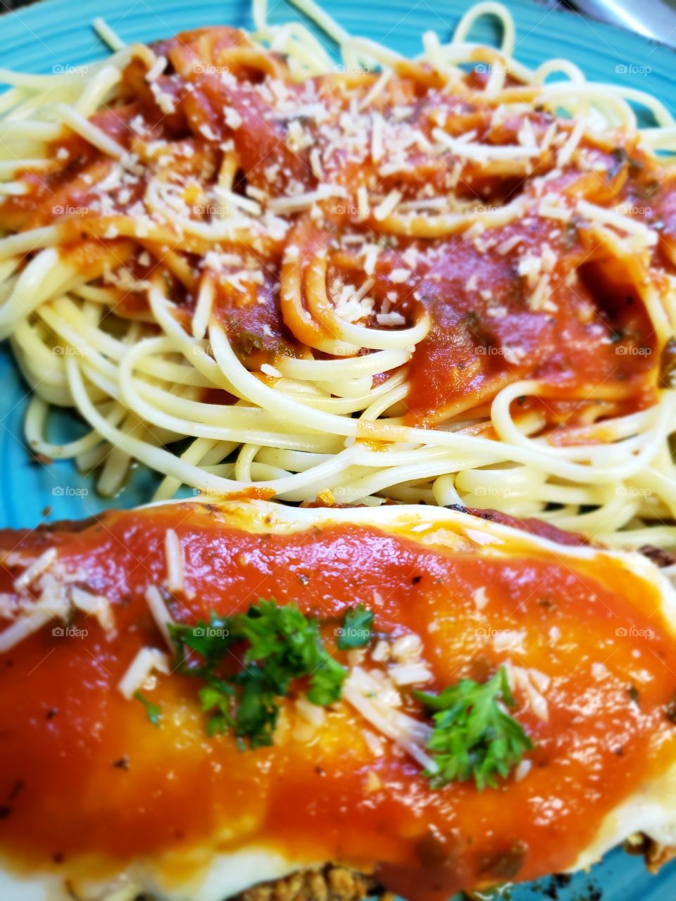 Delicious chicken parmigiana with spaghetti and sauce 
