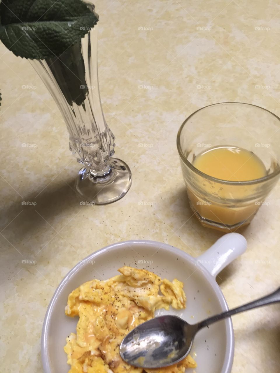 Morning ritual scrambled eggs and orange juice