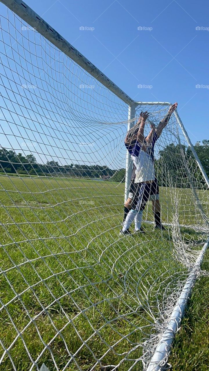 Son, don't give up, if you don't reach the goal, I'll always be there to give you that stretch.