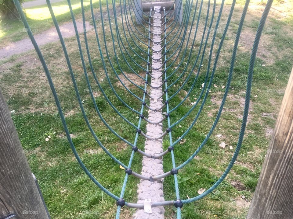 Rope bridge in children's play area at Mill Hill Park
