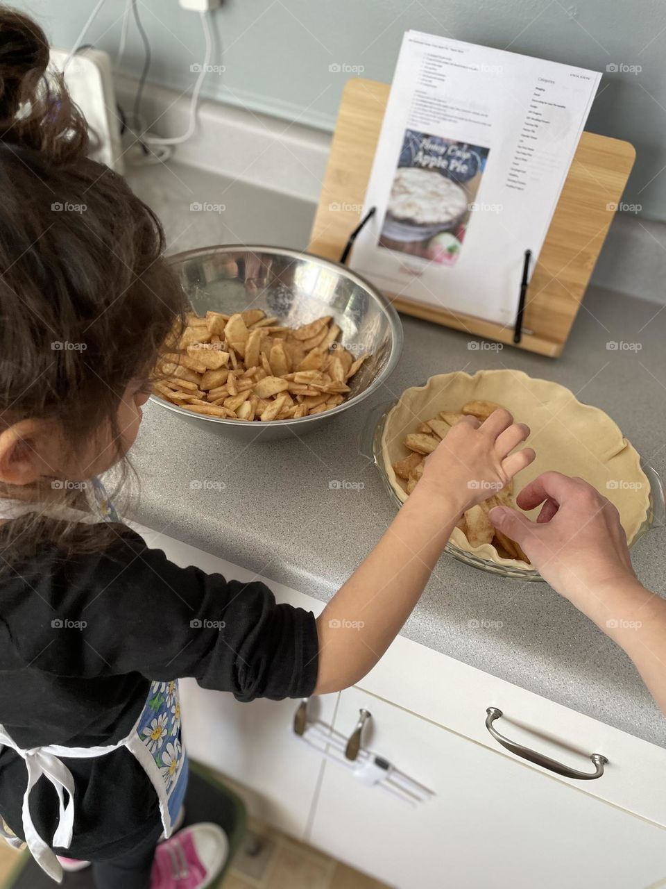 Mother and daughter making pie together, apple pie made at home, delicious pie made with toddler, making apple pie with a toddler, first apple pie made