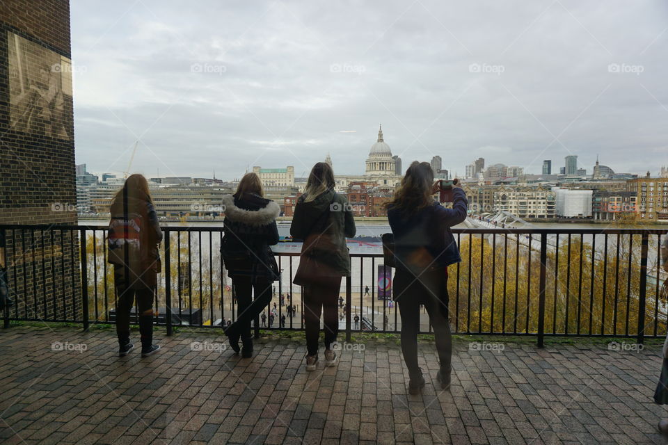 Tourists admiring the view of St Paul’s Cathedral London 