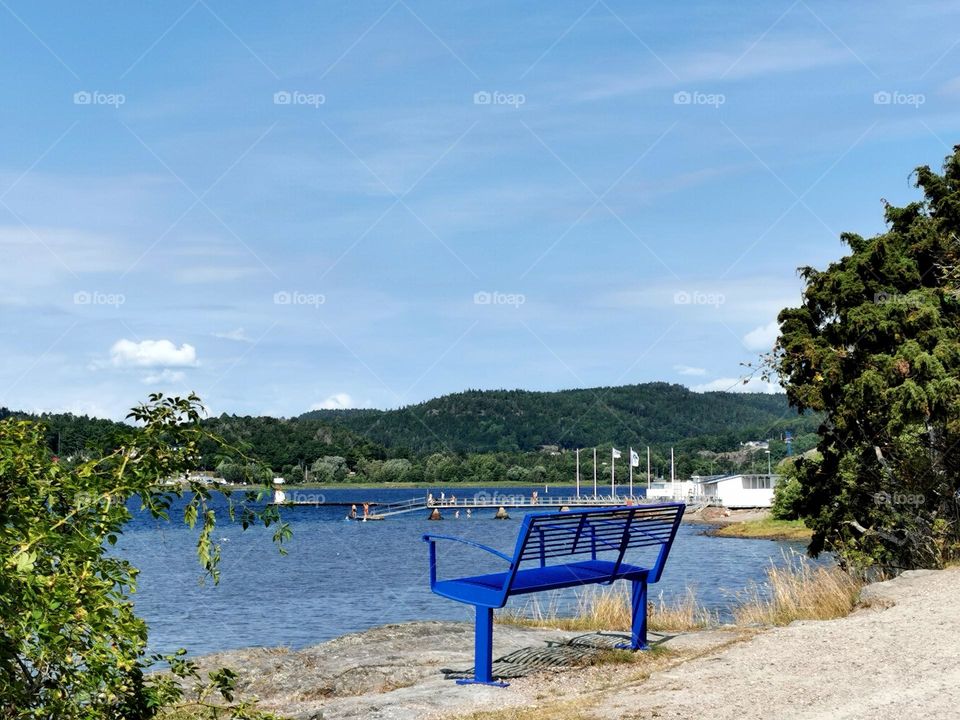 Blue bench with seaview