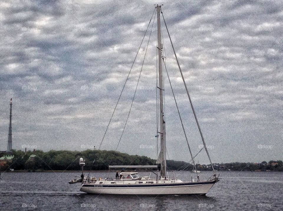 Let's go sailing. Sailboat, island, water, sky