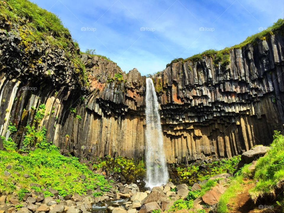 Basalt columns waterfall in Iceland