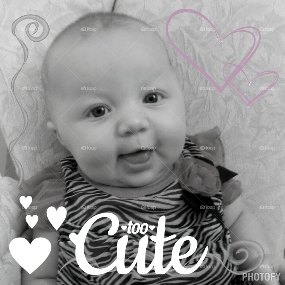 Too cute!. My baby girl loves the camera. She smiles every time!