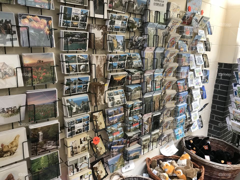 A huge display of postcards for sale, l am thrilled that people still buy them, bread for them to become  an old relic.
