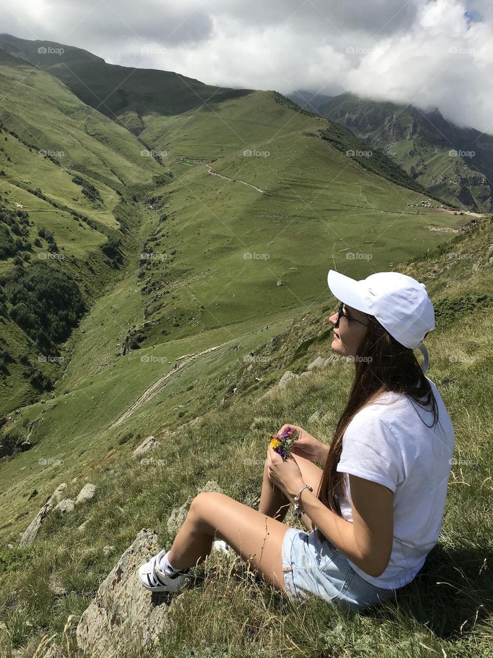 Happy woman hiker enjoying mountain trip, scenery beautiful view 