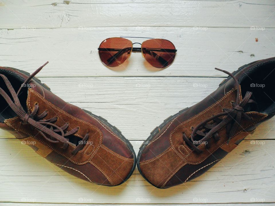 Men's shoes and sunglasses