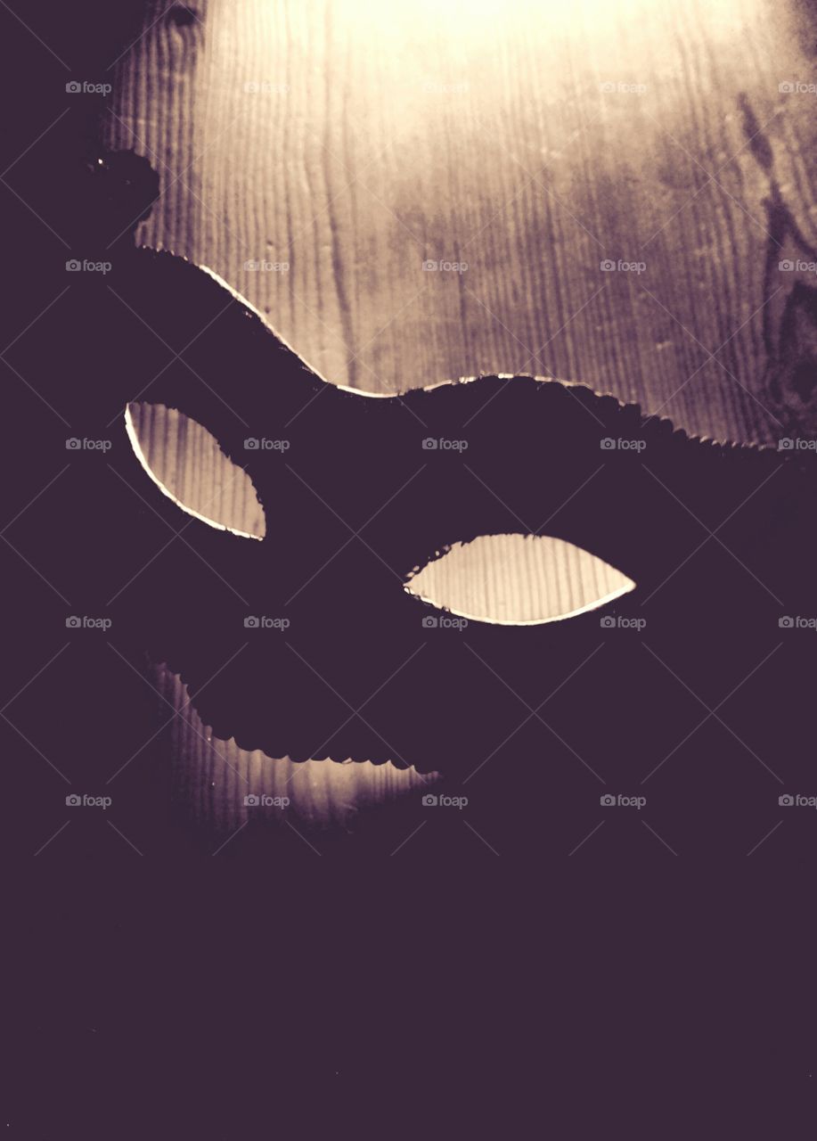 Masquerade mask on table