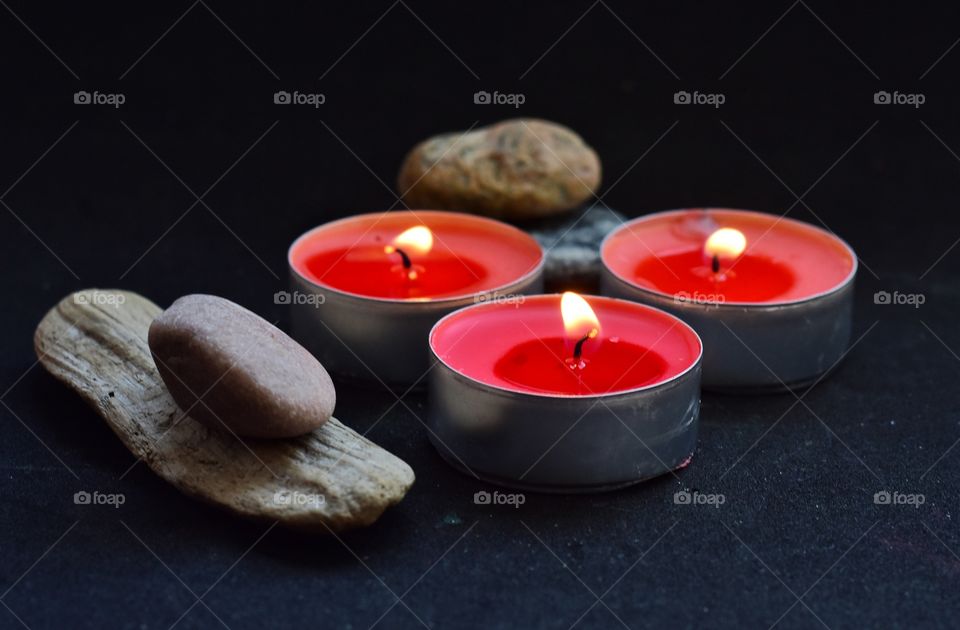 red candles on black background