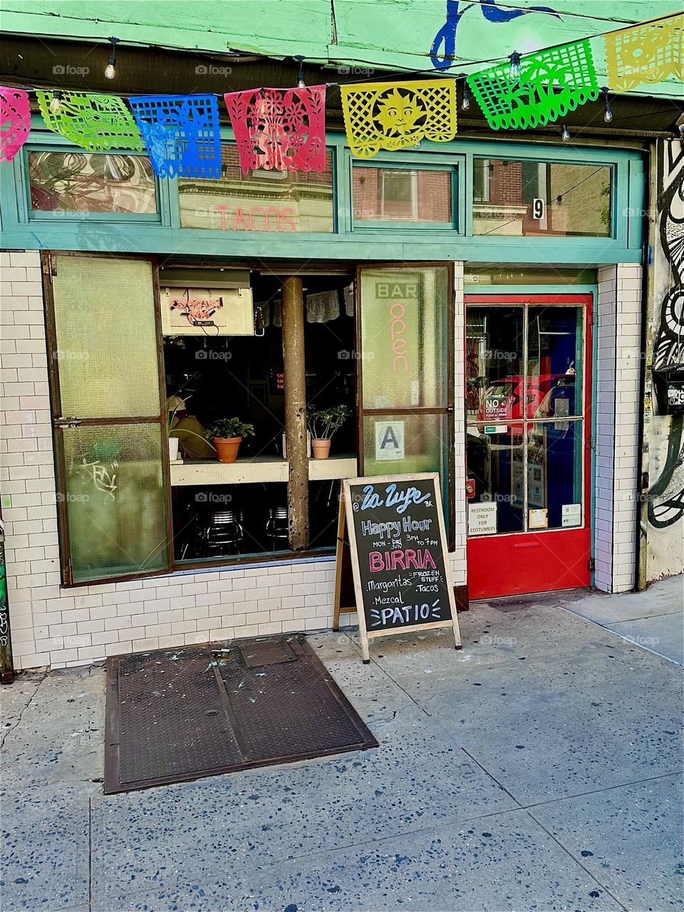 This is “La Lupe”, a Latin club and restaurant on “Jefferson Street” off “Broadway” and “Myrtle Avenue” in “Bushwick”, Brooklyn. 2024. Hypnotic Productions