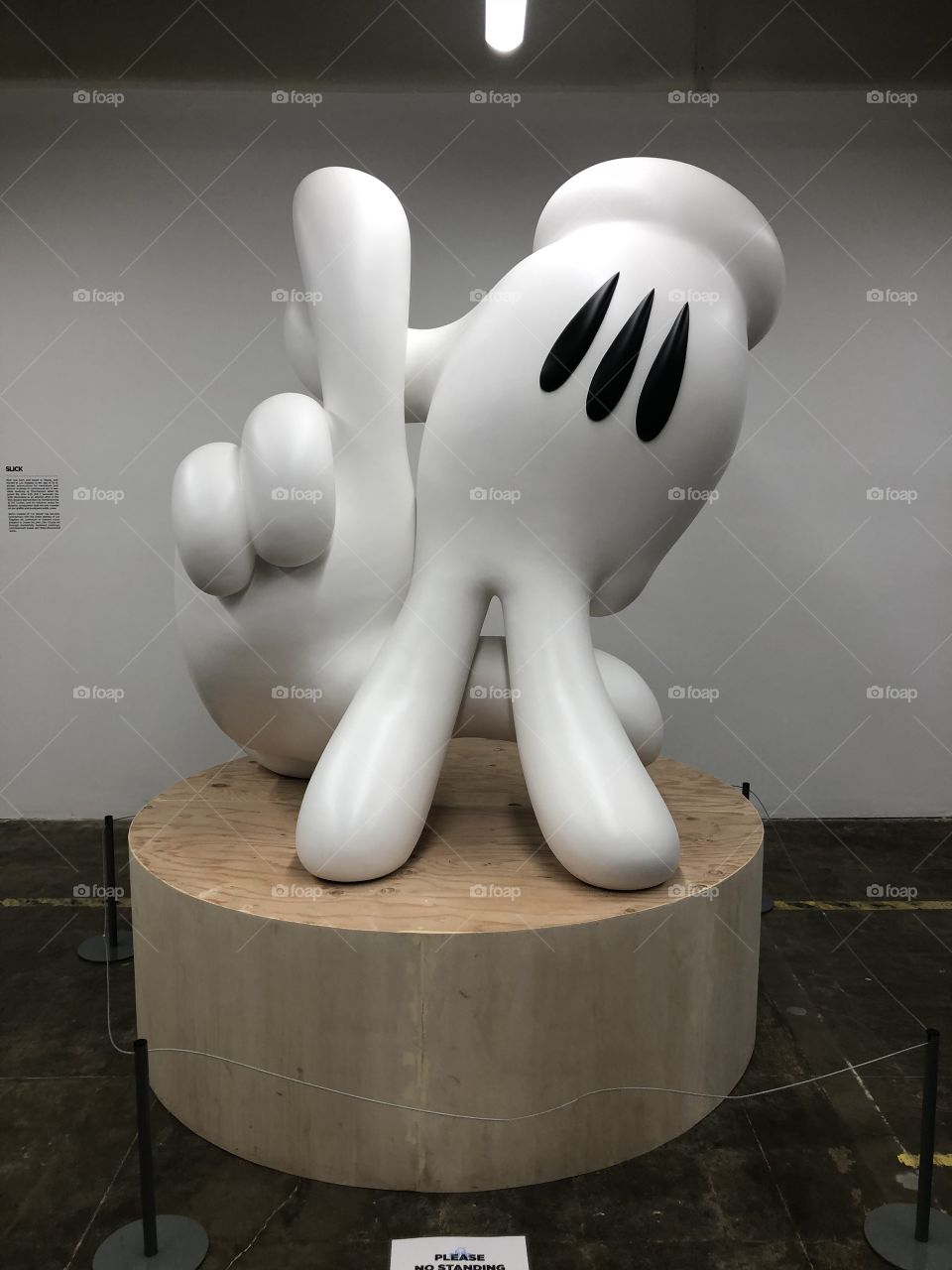 Slick’s creation of “LA Hands” at Beyond the Streets art exhibit in Los Angeles near Chinatown 