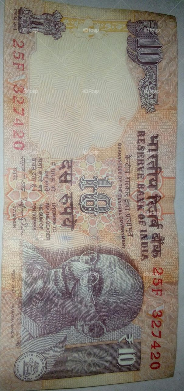Indian currency with serial number 420