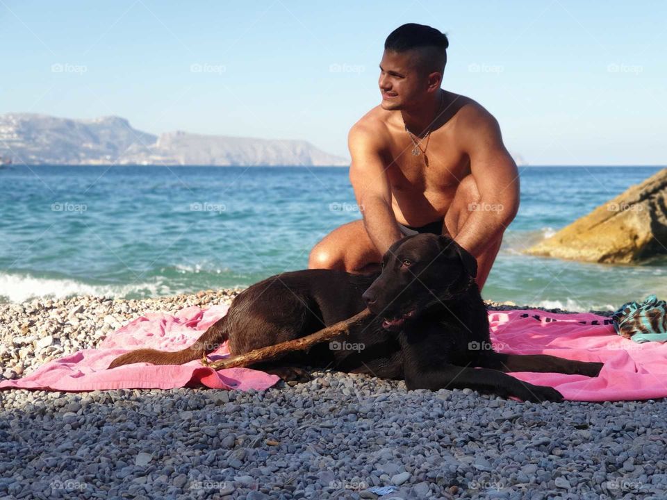 Labrador#canine#dog#human#beach#sea#relax