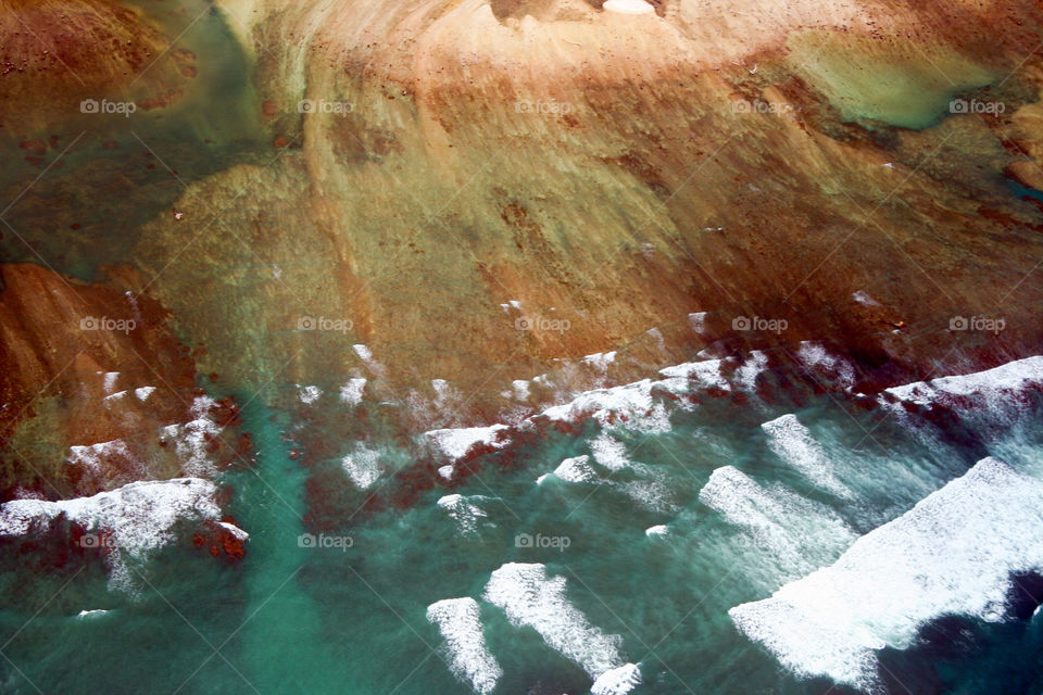 Aerial view of beach and waves
