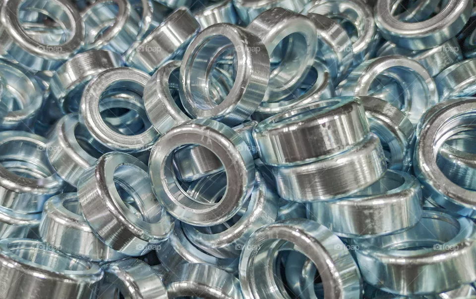 Round metal parts made on a lathe