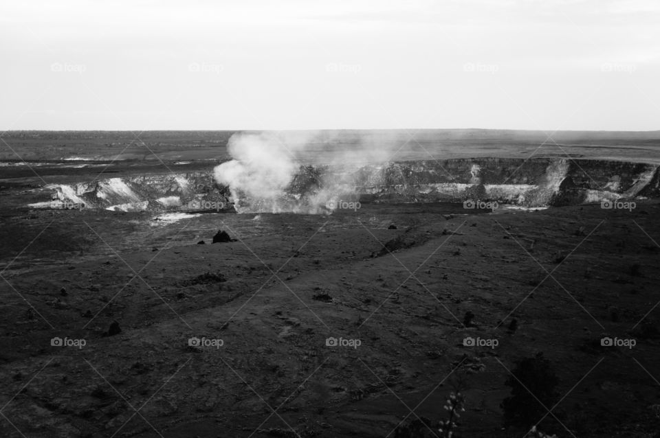 Black and white view of a volcano at Hawaii Volcano National Park on the Big Island in Hawaii. 