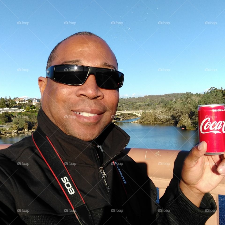 having a Coke and a smile