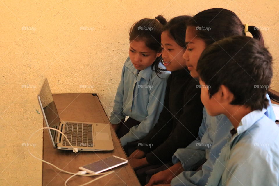 watching Little red riding hood in laptop. 
Our mini virtual class 
grade 5
from Nepal.