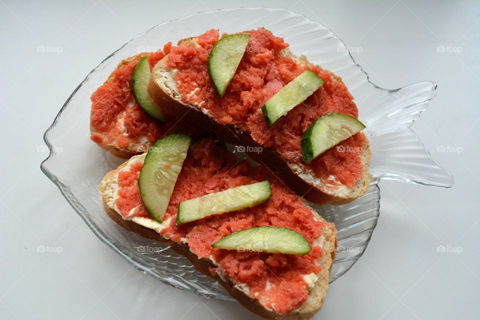 sandwiches with red fish and cucumber