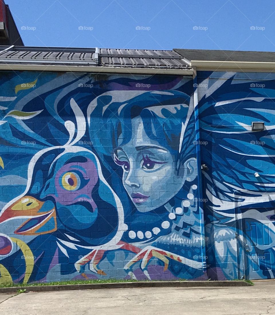 Visions of downtown, street art, graffiti, vibrant blues