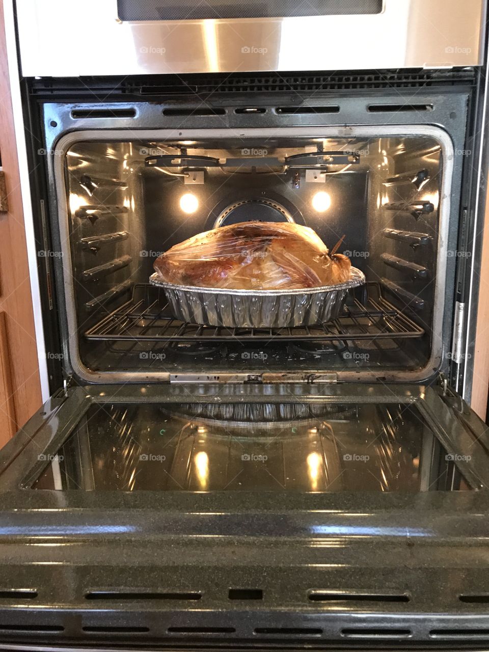Thanksgiving turkey cooking in the oven