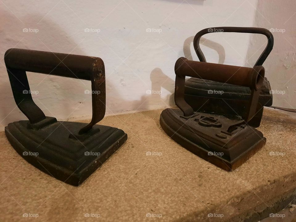 Set of three antique cast irons