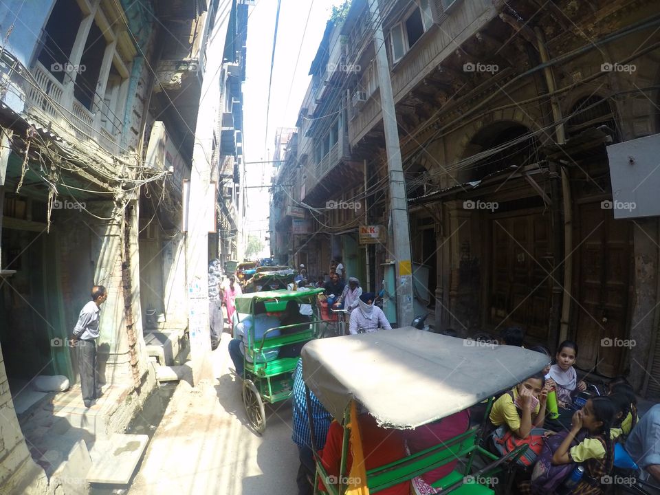 cycle rickshaw passing through a narrow street at amritsar