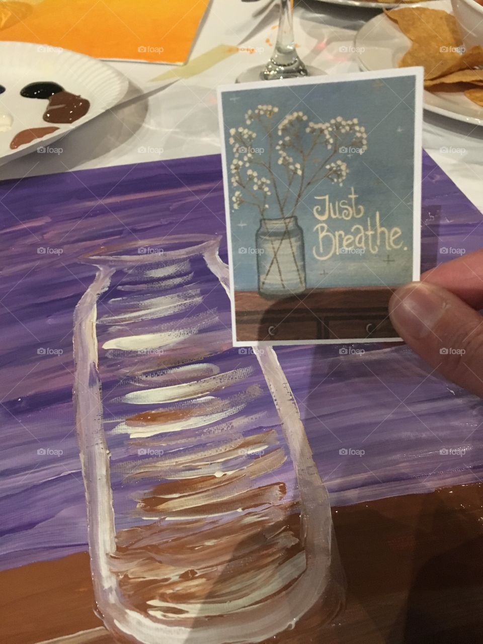 Painting at a paint & partake fundraising event 