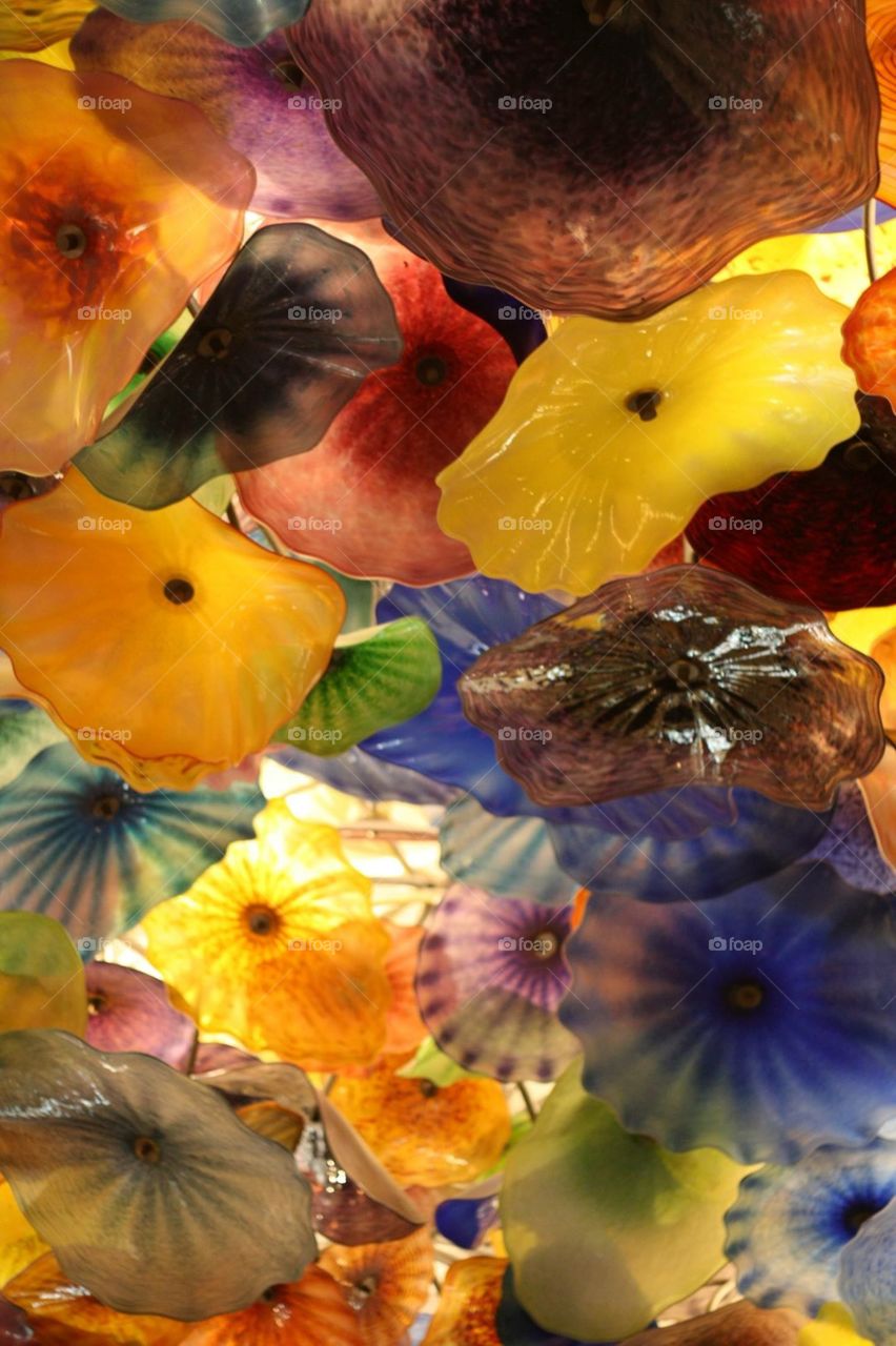 Dale Chihuly's Fiori di Como covers the lobby ceiling of the bellagio in las vegas with over 2000 pieces of hand-blown glass sculptures.