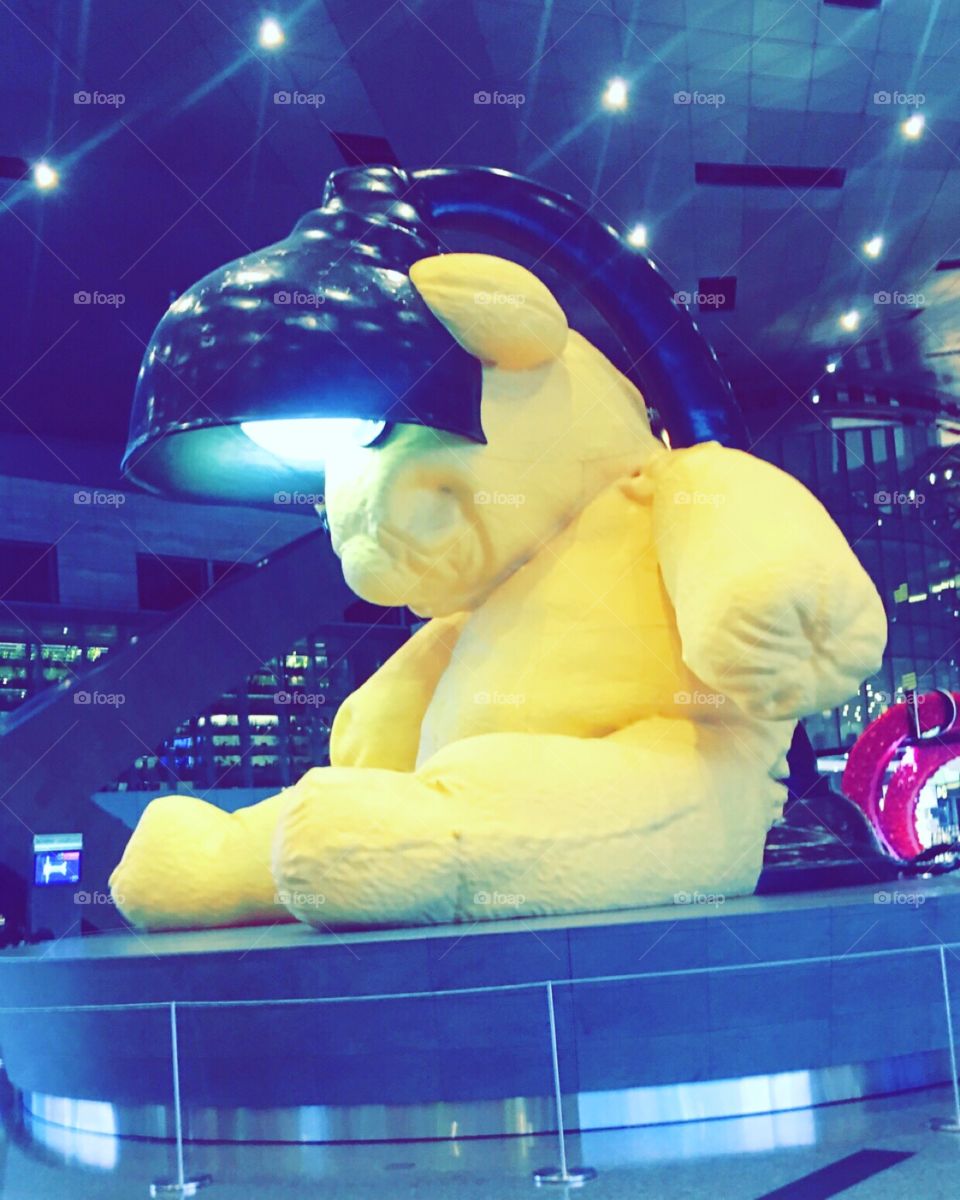 Qatar Airport - Yellow bear who watches over travellers like a guardian angel with its beautiful light. 