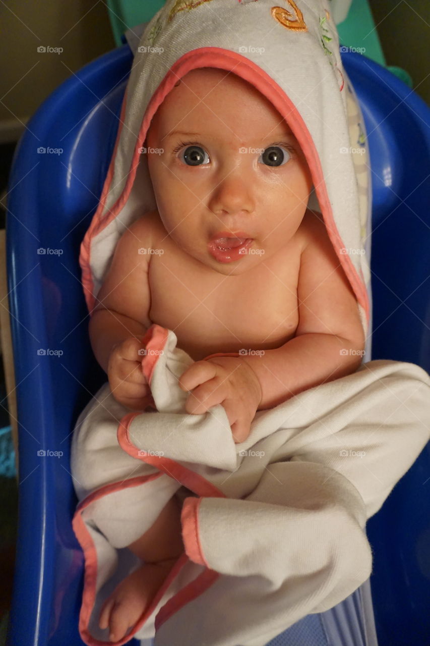 Baby boy sitting in stroller