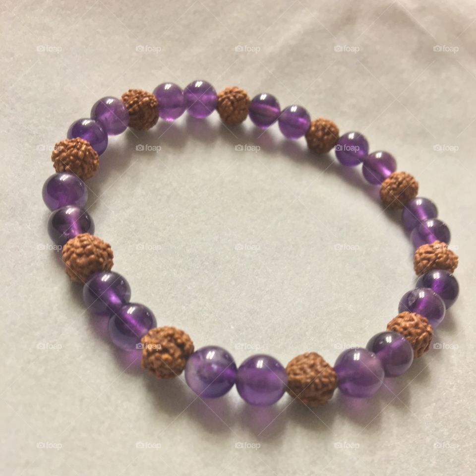 Handmade Amethyst and Rudraksha seed bracelet for healing and protection 