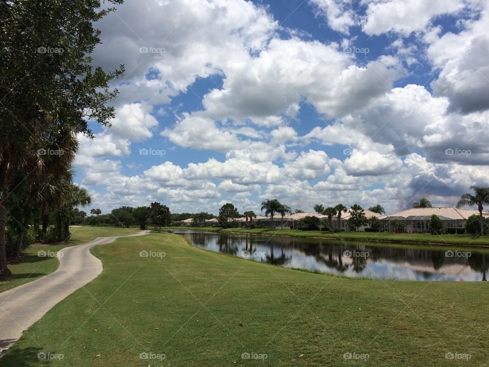 Puffy white clouds on the Florida golf course 