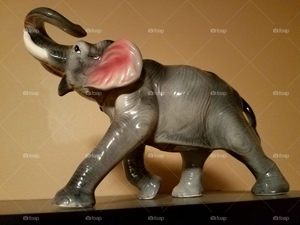 Ceramic grey elephant.