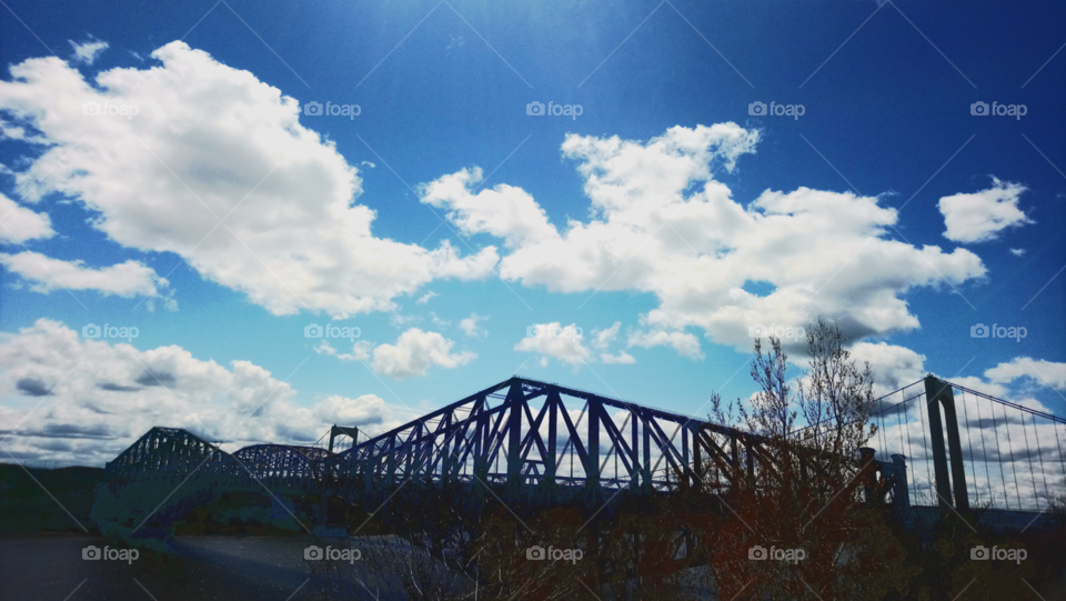Sunny day with blue sky above the bridge