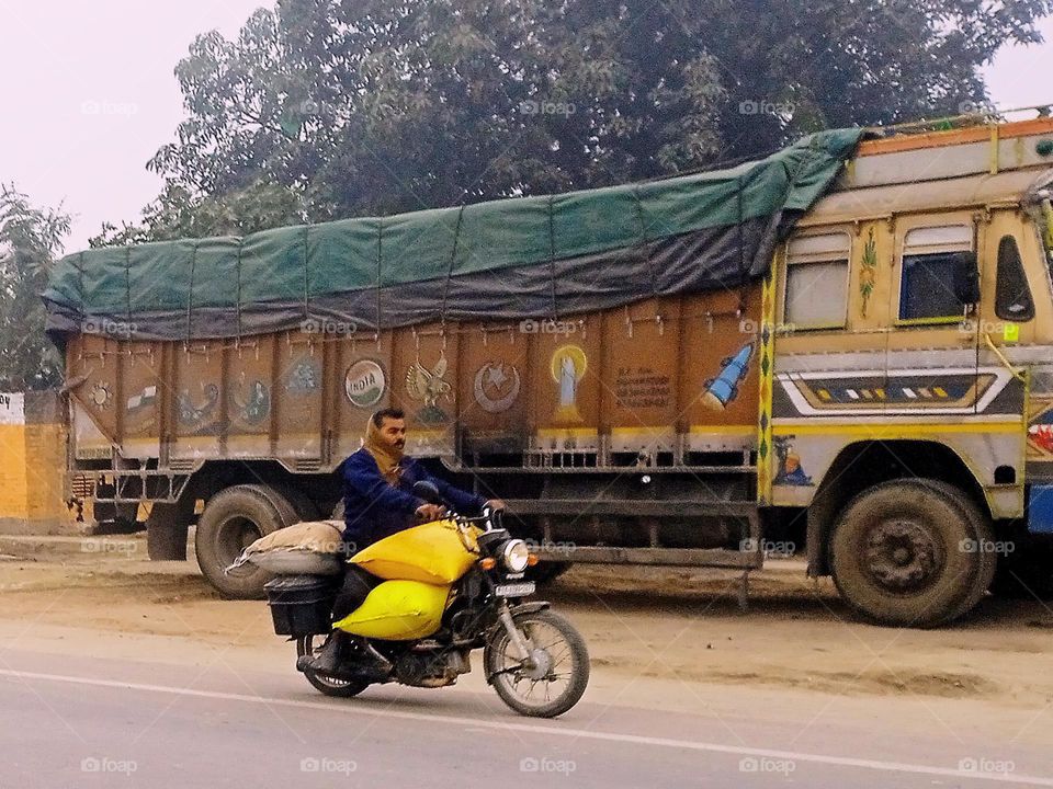 highway road on side truck and motor vehicle
