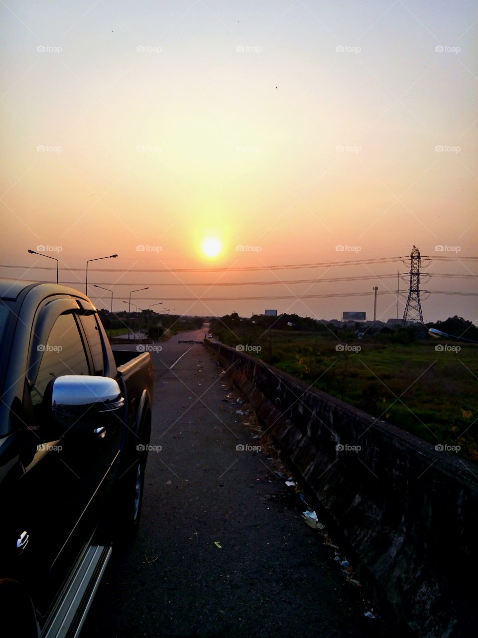 sunset. long road