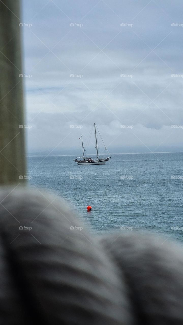 A yacht anchored in the bay.Mossel bay South Africa.