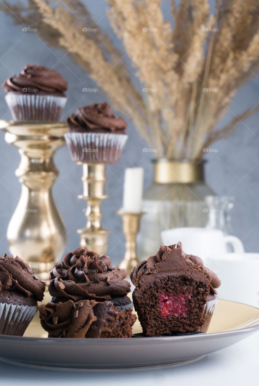 chocolate muffins with raspberry jam