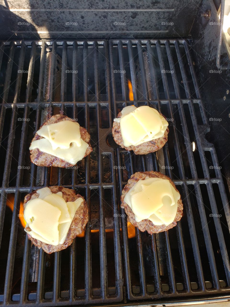 burgers on grill