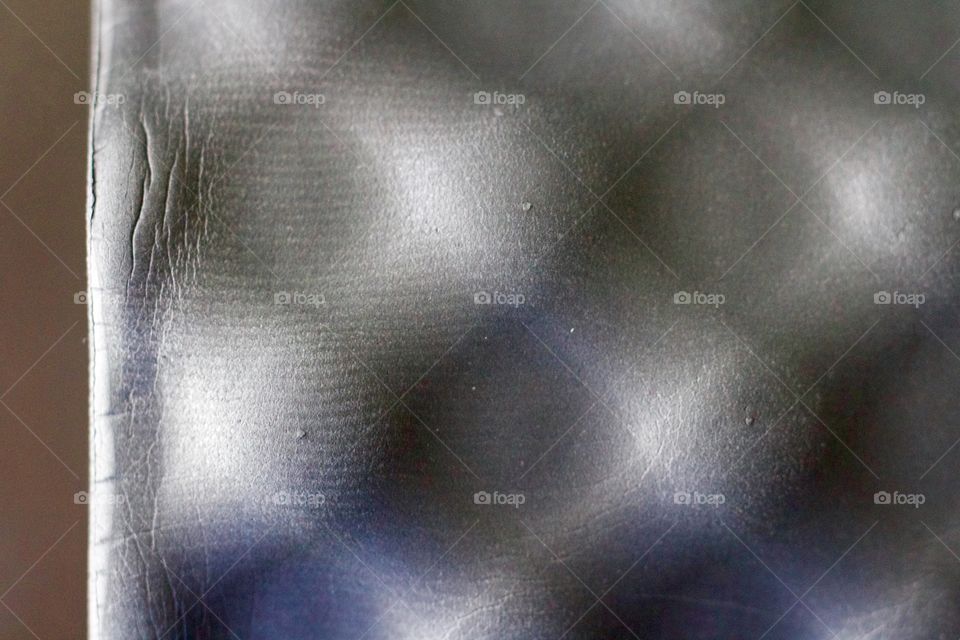 Creative Textures - closeup of black textured  foam surface 