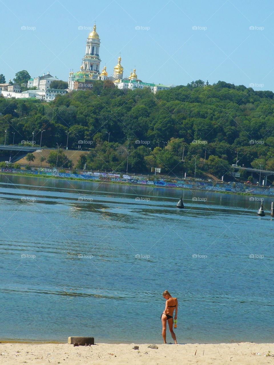 girl on the beach near the river Dnieper