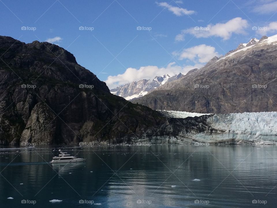 Glacier Bay National Park 
Breath taking glacier surrounded by mountains. 
Alaska