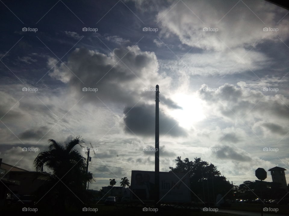 Sun and black clouds