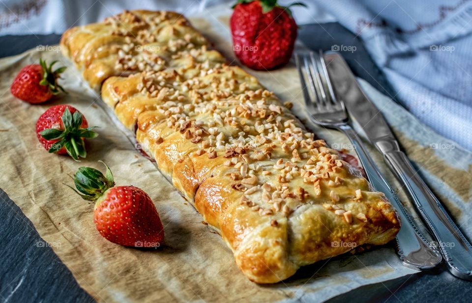 Strawberry and chocolate stuffed puff pastry braid