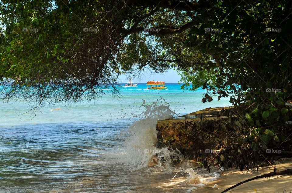 Water splash in hidden bay in Barbados 